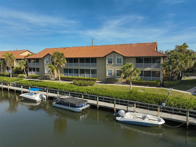 dock area featuring a water view