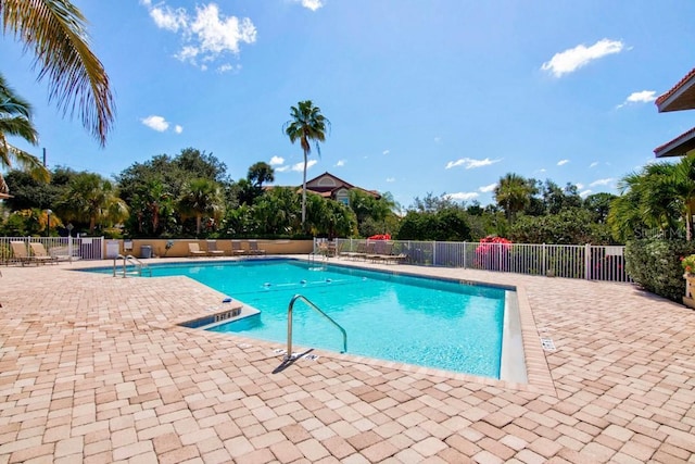 view of pool featuring a patio area