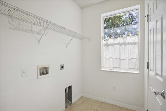 laundry room with washer hookup, light tile patterned floors, and electric dryer hookup