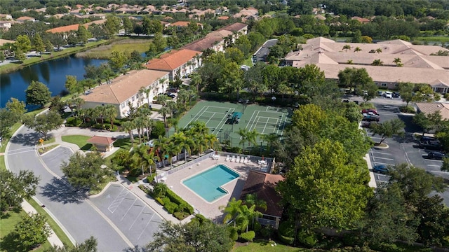 birds eye view of property featuring a water view