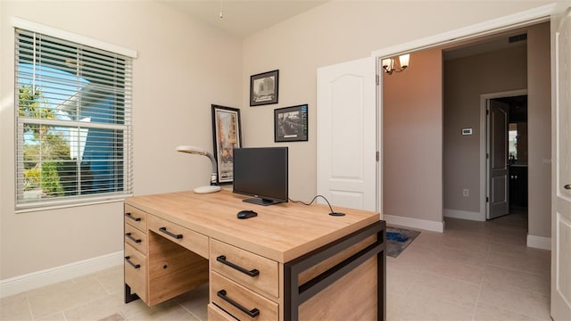 office area with light tile patterned floors