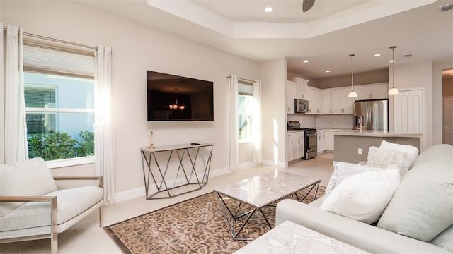 4326 Tamarind Pl, Bradenton, FL 34203 - living room with ceiling fan, recessed lighting, light tile patterned floors, and baseboards