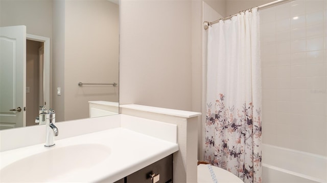 full bathroom featuring vanity, toilet, and shower / bath combo with shower curtain