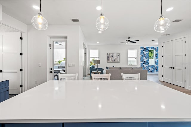 kitchen featuring a kitchen island and pendant lighting