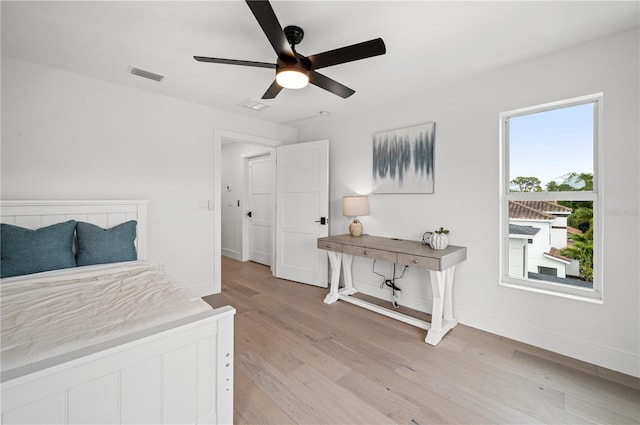 bedroom featuring ceiling fan and light hardwood / wood-style floors