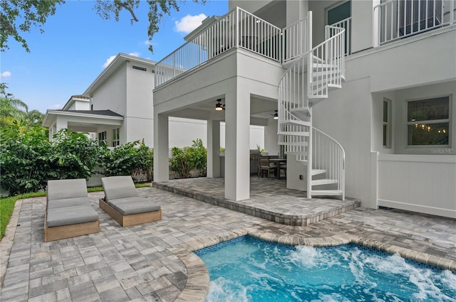 exterior space with a patio and ceiling fan