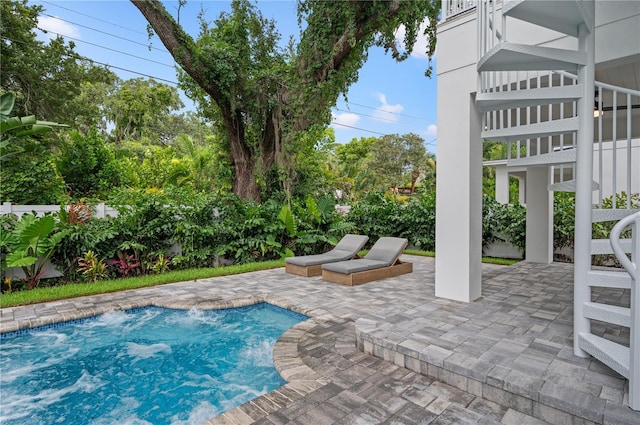 view of swimming pool featuring a patio