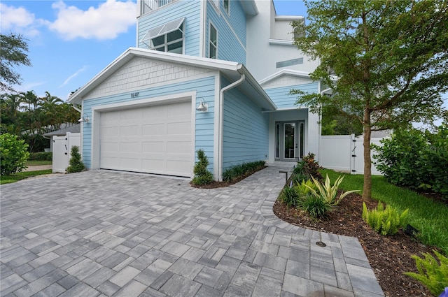 view of front of home with a garage