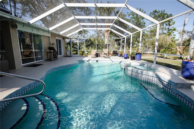 view of pool featuring a lanai and a patio area