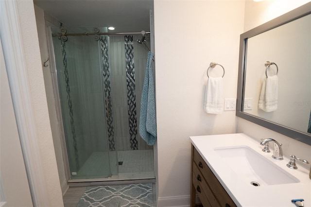 bathroom featuring vanity and walk in shower