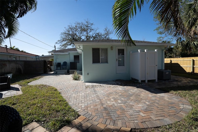 rear view of house with a patio area