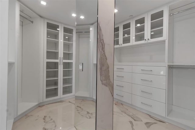415 L Ambiance Dr Unit A801, Longboat Key, FL 34228 - spacious closet with light marble finish floors