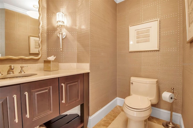 bathroom featuring crown molding, tile patterned flooring, vanity, and toilet