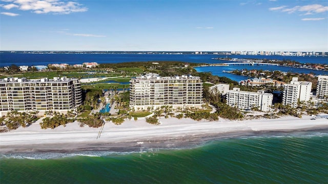 aerial view featuring a water view and a view of the beach