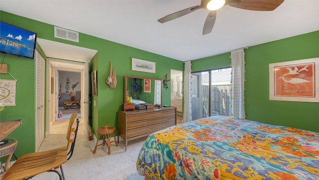 bedroom featuring ceiling fan and light tile patterned floors