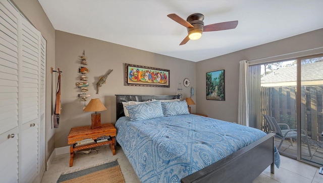 tiled bedroom featuring ceiling fan, access to exterior, and a closet