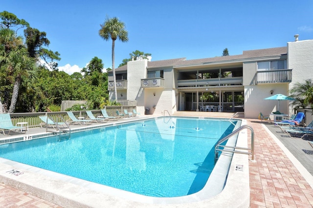 view of pool featuring a patio