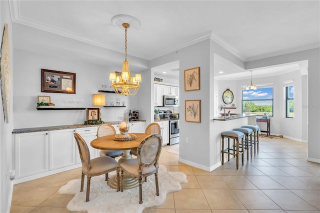 dining area with a notable chandelier, ornamental molding, and light tile patterned flooring