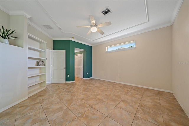 tiled empty room featuring ceiling fan, built in features, and ornamental molding