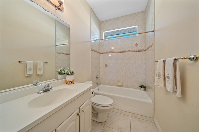 full bathroom with toilet, tiled shower / bath, tile patterned flooring, and vanity