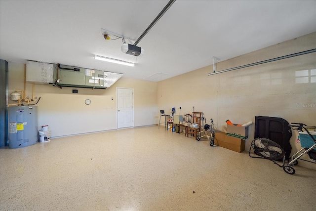 garage featuring water heater and a garage door opener