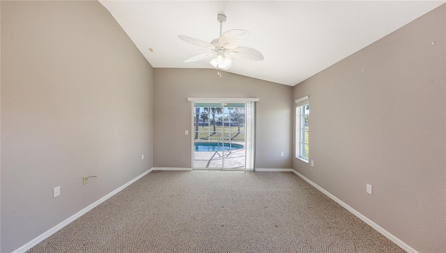 42 Marker Rd, Rotonda West, FL 33947 - empty room with a ceiling fan, lofted ceiling, light colored carpet, and baseboards