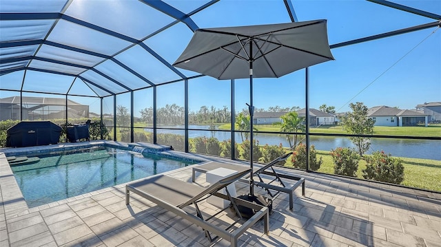 view of swimming pool with a water view, glass enclosure, and a patio area