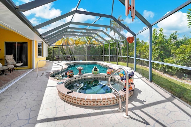 view of swimming pool featuring an in ground hot tub, glass enclosure, and a patio area