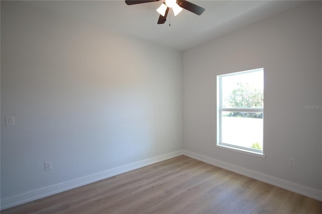 6779 David Blvd, Port Charlotte, FL 33981 - unfurnished room featuring a ceiling fan and wood finished floors