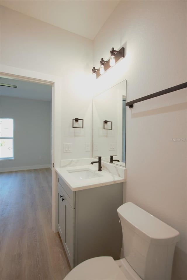 6779 David Blvd, Port Charlotte, FL 33981 - bathroom featuring vanity and wood finished floors