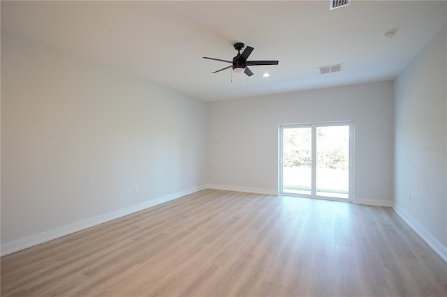 6779 David Blvd, Port Charlotte, FL 33981 - unfurnished room featuring light wood finished floors, ceiling fan, a smoke detector, and recessed lighting