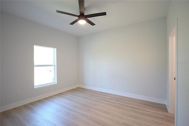6779 David Blvd, Port Charlotte, FL 33981 - spare room featuring light wood-style floors and a ceiling fan