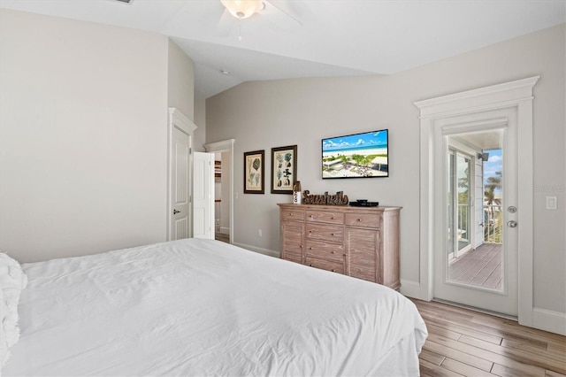 bedroom with access to outside, light hardwood / wood-style flooring, ceiling fan, and lofted ceiling