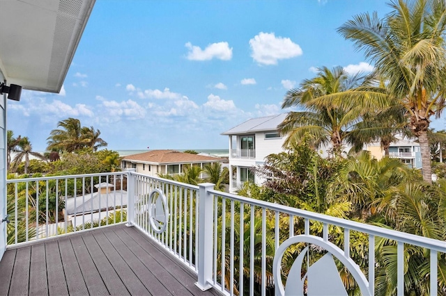 balcony featuring a water view