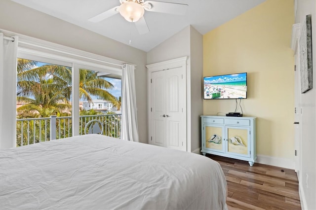 bedroom featuring access to outside, ceiling fan, and vaulted ceiling