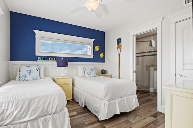 bedroom featuring hardwood / wood-style flooring and ceiling fan