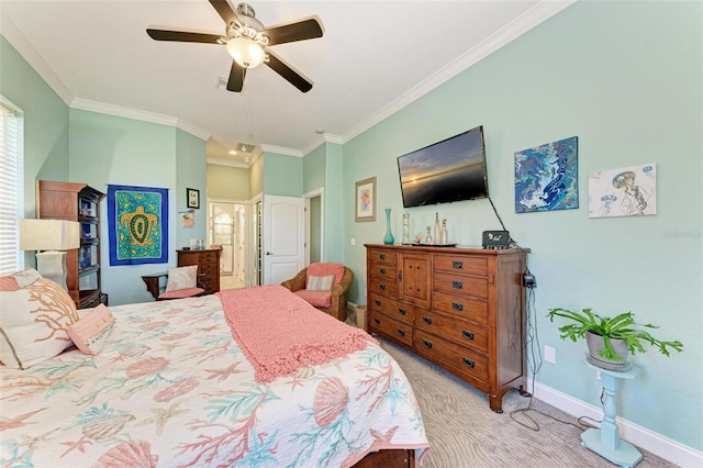 carpeted bedroom featuring ceiling fan and ornamental molding