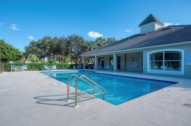 view of pool with a patio area