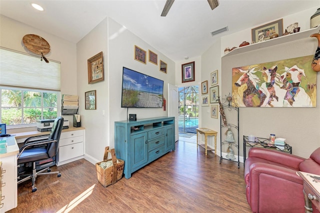 office with plenty of natural light, ceiling fan, and dark wood-type flooring