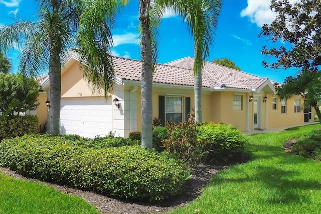 view of side of home with a garage