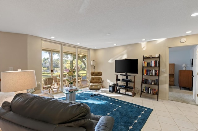 tiled living room with a textured ceiling