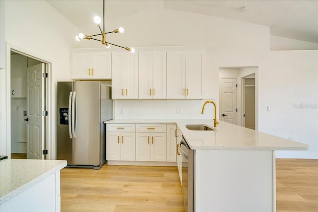 kitchen featuring light hardwood / wood-style floors, sink, white cabinetry, and stainless steel appliances