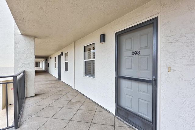 property entrance with a balcony