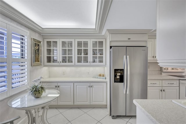 kitchen with white cabinets, white electric range oven, stainless steel refrigerator with ice dispenser, and ornamental molding