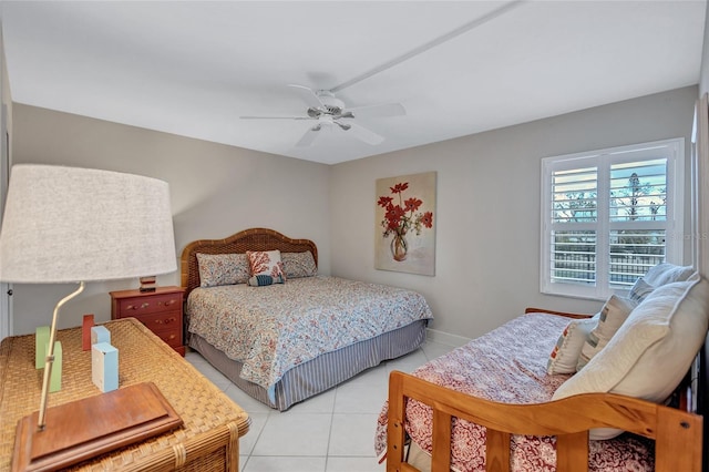 bedroom featuring ceiling fan and light tile patterned floors