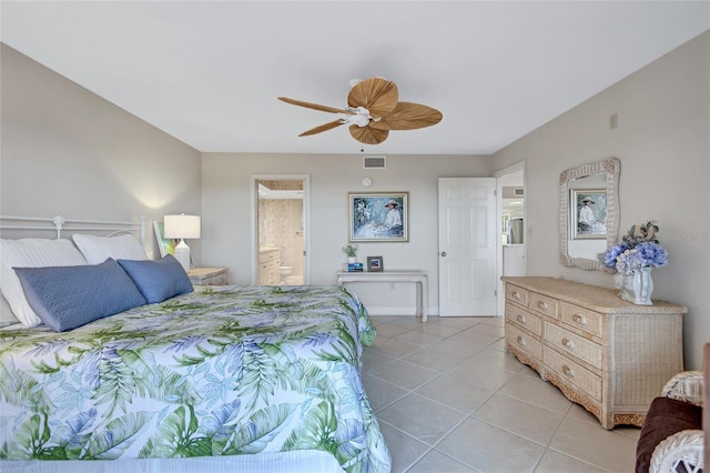 tiled bedroom with ceiling fan and connected bathroom