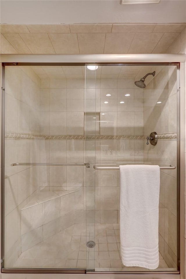 bathroom with an enclosed shower