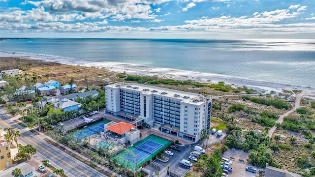 bird's eye view with a view of the beach and a water view