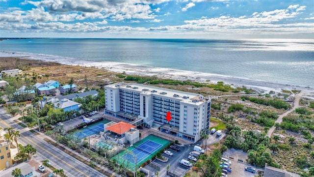 aerial view featuring a beach view and a water view