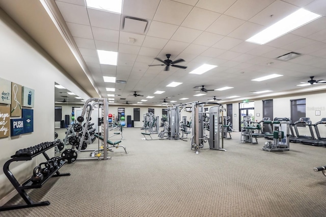 exercise room with a drop ceiling